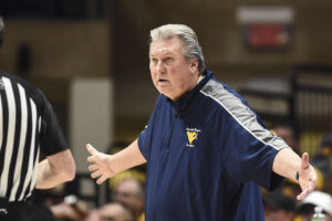Huggins makes public statement saying WVU's announcement of his resignation was false